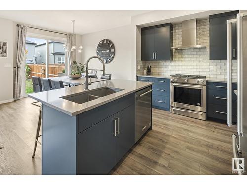 15184 25 St Nw, Edmonton, AB - Indoor Photo Showing Kitchen With Double Sink With Upgraded Kitchen