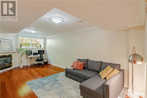 Fully Finished Basement - 22 Mcpeake Place, Ottawa, ON - Indoor Photo Showing Living Room With Fireplace