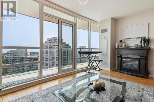 1208 - 2240 Lake Shore Boulevard, Toronto, ON - Indoor Photo Showing Living Room With Fireplace