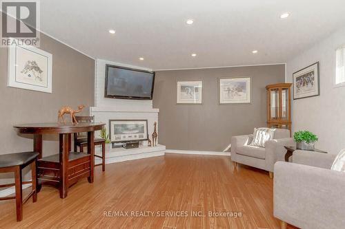 32 Simmons Boulevard, Brampton, ON - Indoor Photo Showing Living Room With Fireplace