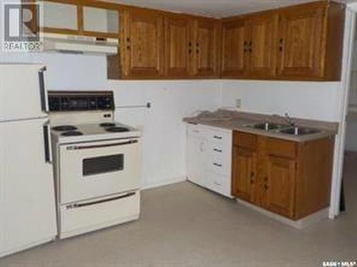 413 Idylwyld Drive N, Saskatoon, SK - Indoor Photo Showing Kitchen With Double Sink