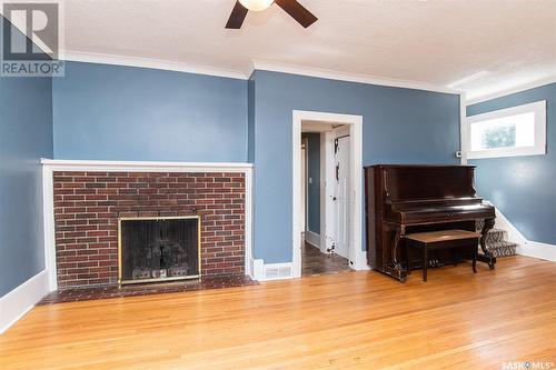 308 2Nd Street E, Wynyard, SK - Indoor Photo Showing Living Room With Fireplace