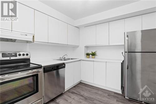 2760 Carousel Crescent Unit#1111, Ottawa, ON - Indoor Photo Showing Kitchen With Stainless Steel Kitchen With Double Sink