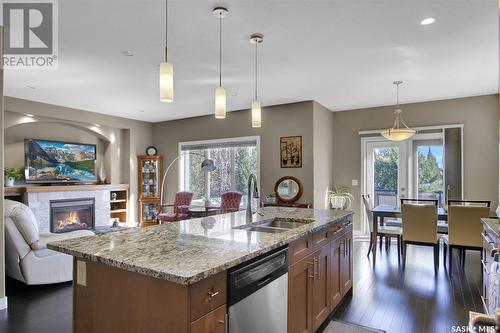 5262 Aviator Crescent, Regina, SK - Indoor Photo Showing Kitchen With Fireplace With Double Sink With Upgraded Kitchen