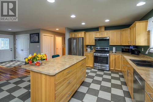 7000 Dawson Road, Prince George, BC - Indoor Photo Showing Kitchen With Stainless Steel Kitchen With Double Sink