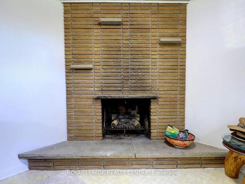 8 Bell Royal Crt, Toronto, ON - Indoor Photo Showing Living Room With Fireplace