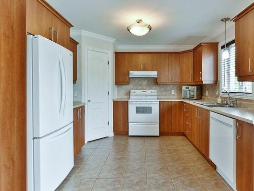 Cuisine - 224 Rue De Langloiserie, Rosemère, QC - Indoor Photo Showing Kitchen With Double Sink