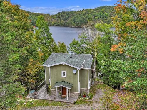 Frontage - 84 Ch. De La Source, Val-Des-Monts, QC - Outdoor With Body Of Water