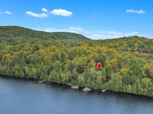 Aerial photo - 84 Ch. De La Source, Val-Des-Monts, QC - Outdoor With Body Of Water With View