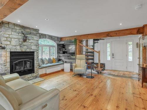 Overall view - 84 Ch. De La Source, Val-Des-Monts, QC - Indoor Photo Showing Living Room With Fireplace