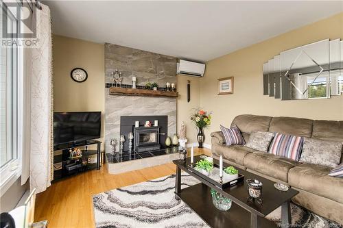 41 Route 933, Grand-Barachois, NB - Indoor Photo Showing Living Room With Fireplace