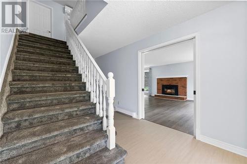 876 Russett Drive, Arnprior, ON - Indoor Photo Showing Other Room With Fireplace