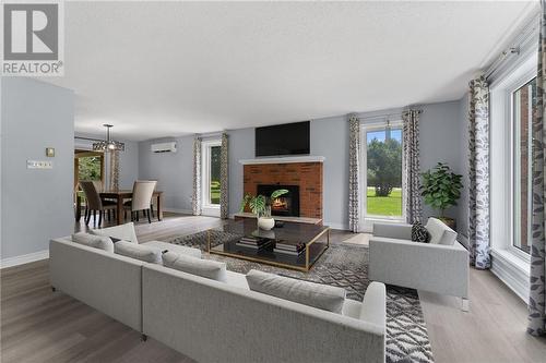 876 Russett Drive, Arnprior, ON - Indoor Photo Showing Living Room With Fireplace