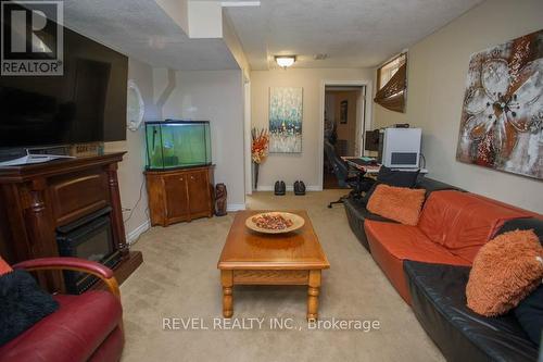 52 Beckett Drive, Brantford, ON - Indoor Photo Showing Living Room With Fireplace