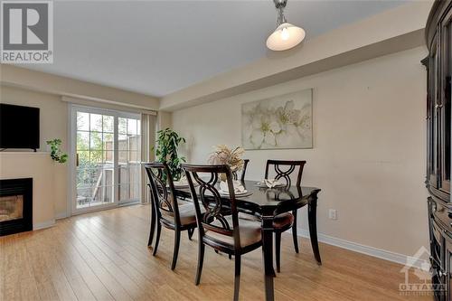 128 Cedardown Private, Ottawa, ON - Indoor Photo Showing Dining Room With Fireplace