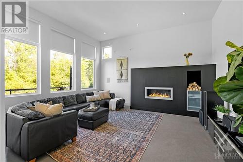 1700 Peter Robinson Road, Ottawa, ON - Indoor Photo Showing Living Room With Fireplace