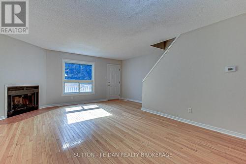 36 - 1786 Attawandaron Road, London, ON - Indoor Photo Showing Living Room With Fireplace