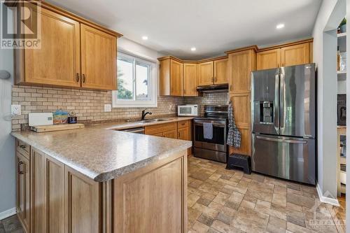 13 Ridgeburn Gate, Ottawa, ON - Indoor Photo Showing Kitchen With Double Sink