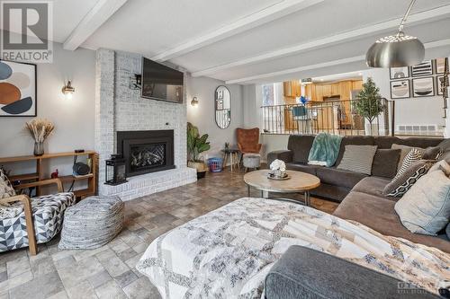 13 Ridgeburn Gate, Ottawa, ON - Indoor Photo Showing Living Room With Fireplace