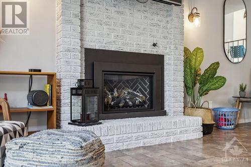 13 Ridgeburn Gate, Ottawa, ON - Indoor Photo Showing Living Room With Fireplace