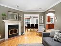 Salle familiale - 230 Rue Gordon, Châteauguay, QC  - Indoor Photo Showing Living Room With Fireplace 