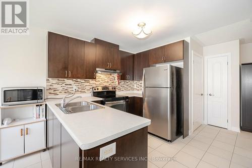 43 - 17 Lacorra Way, Brampton, ON - Indoor Photo Showing Kitchen With Stainless Steel Kitchen With Double Sink