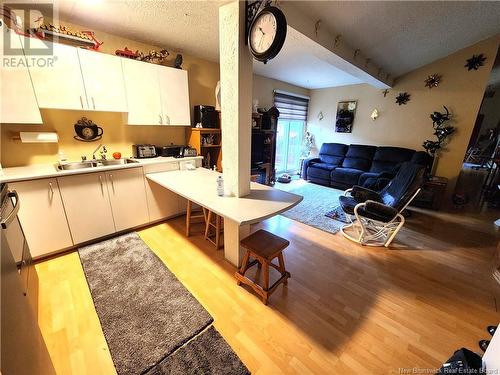 296 Victoria Street, Edmundston, NB - Indoor Photo Showing Kitchen With Double Sink