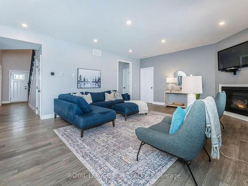 373373 6Th Line, Amaranth, ON - Indoor Photo Showing Living Room With Fireplace