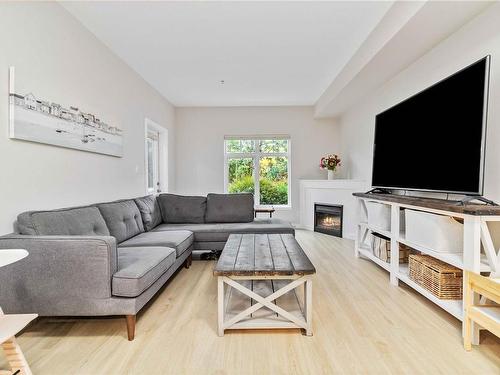 101-7088 West Saanich Rd, Central Saanich, BC - Indoor Photo Showing Living Room With Fireplace