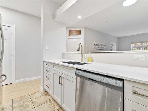 101-7088 West Saanich Rd, Central Saanich, BC - Indoor Photo Showing Kitchen With Double Sink