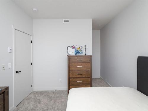 402-2465 Gateway Rd, Langford, BC - Indoor Photo Showing Bedroom