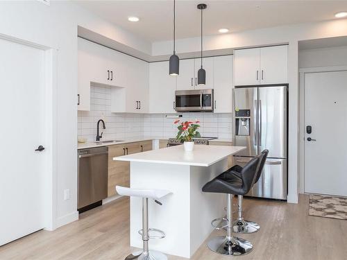 402-2465 Gateway Rd, Langford, BC - Indoor Photo Showing Kitchen With Stainless Steel Kitchen With Upgraded Kitchen