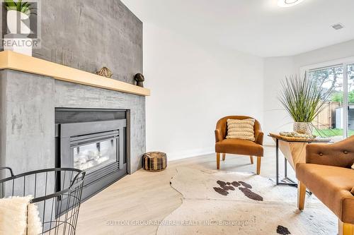 8 Cuthbert Street, Barrie, ON - Indoor Photo Showing Living Room With Fireplace