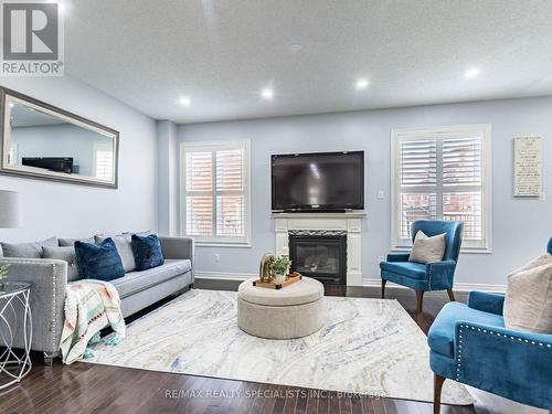 107 Aylesbury Drive E, Brampton, ON - Indoor Photo Showing Living Room With Fireplace