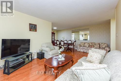 802 - 100 County Court Boulevard, Brampton, ON - Indoor Photo Showing Living Room