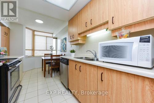 802 - 100 County Court Boulevard, Brampton, ON - Indoor Photo Showing Kitchen With Double Sink