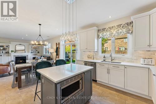 1282 Kettering Drive, Oshawa, ON - Indoor Photo Showing Kitchen With Fireplace With Double Sink