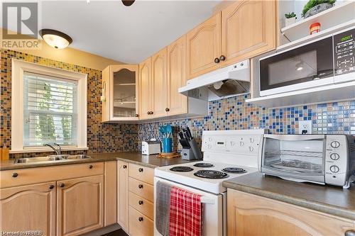 27 Johnson Lane, Callander, ON - Indoor Photo Showing Kitchen With Double Sink