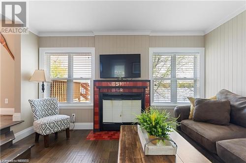 27 Johnson Lane, Callander, ON - Indoor Photo Showing Living Room With Fireplace