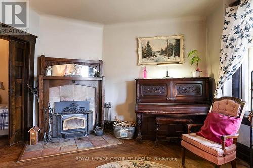 110 Smith Street, Wellington North, ON - Indoor With Fireplace