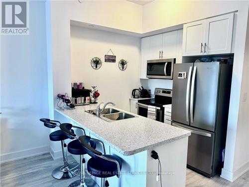 415 - 450 Dundas Street E, Hamilton, ON - Indoor Photo Showing Kitchen With Stainless Steel Kitchen With Double Sink