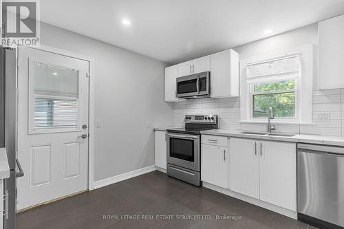 23 Hazel Street, St. Catharines, ON - Indoor Photo Showing Kitchen With Double Sink