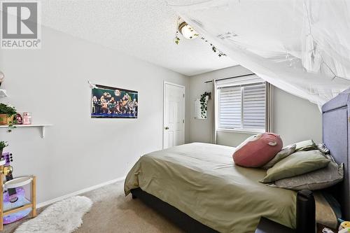 133 Prestwick Mews Se, Calgary, AB - Indoor Photo Showing Bedroom