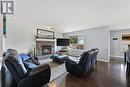 133 Prestwick Mews Se, Calgary, AB  - Indoor Photo Showing Living Room With Fireplace 