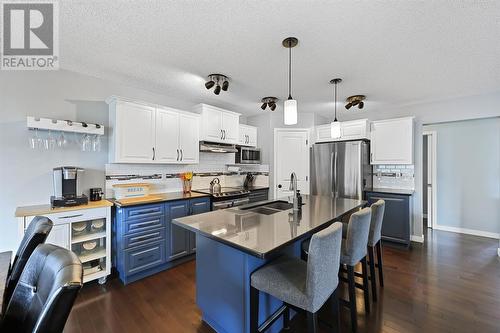 133 Prestwick Mews Se, Calgary, AB - Indoor Photo Showing Kitchen With Stainless Steel Kitchen With Double Sink With Upgraded Kitchen