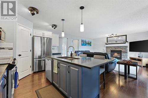 133 Prestwick Mews Se, Calgary, AB - Indoor Photo Showing Kitchen With Stainless Steel Kitchen With Double Sink With Upgraded Kitchen