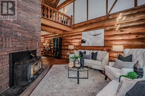 7191 Highway 6, Mapleton, ON - Indoor Photo Showing Living Room With Fireplace