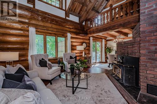 7191 Highway 6, Mapleton, ON - Indoor Photo Showing Living Room With Fireplace