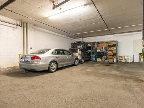 Garage - 107-9910 Boul. Gouin E., Montréal (Rivière-Des-Prairies/Pointe-Aux-Trembles), QC - Indoor Photo Showing Garage