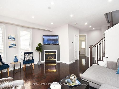 5638 Longboat Ave, Mississauga, ON - Indoor Photo Showing Living Room With Fireplace